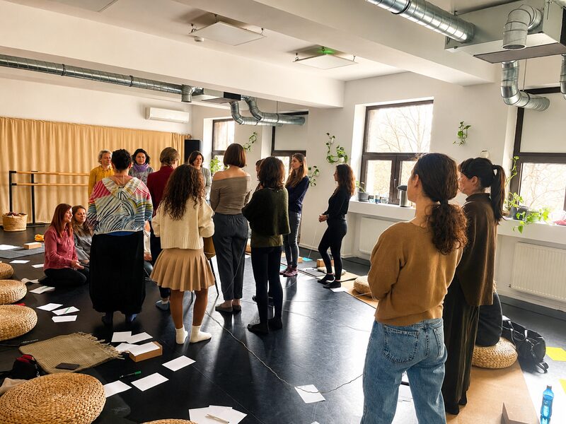 Participants working together in a workshop